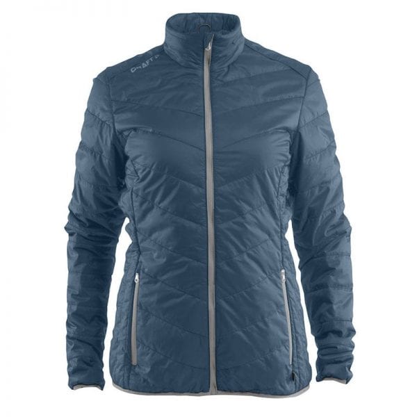 CRAFT Thin Primaloft Jacket, jakke i tyndt materiale der gør den åndbar, lommedetaljer foran. Ducet blå med lyse grå detaljer. Kvindemodel