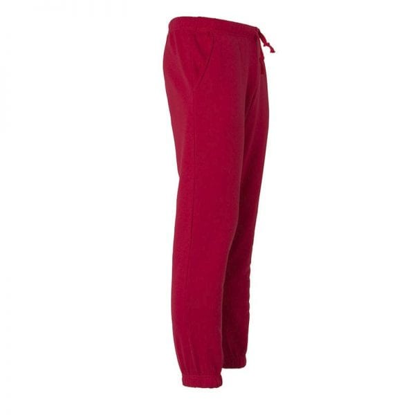 Basic unisex jogging bukser fra CLIQUE - god og behagelig pasform med elastik. Ses her fra siden i farven rød